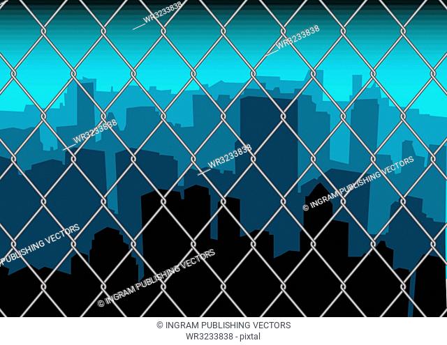 City scape skyline behind a metal fence with blue sky