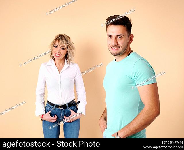 Two young men, a man and a woman, pose in profile with positive aptitude