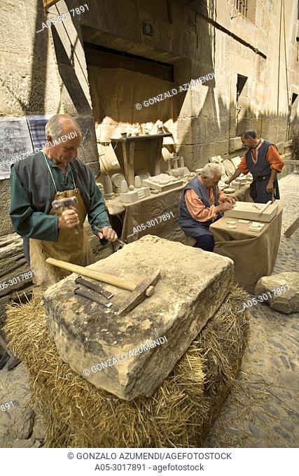 Stonemason. Historical reenactment of the life of a Castilian town in the 14th century. Medieval Festival. Briones. La Rioja. Spain
