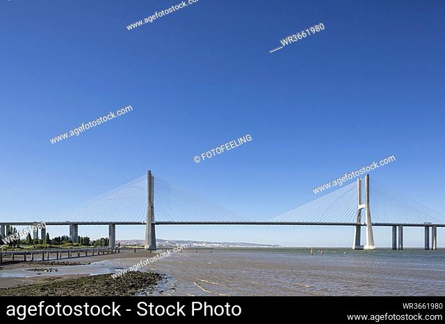 Portugal, Lisbon, View of Vasco da Gama bridge at River Tagus