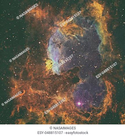 Massive stars lie within NGC 6357 or Lobster Nebula, an expansive emission nebula complex in the constellation Scorpius. Retouched colored image
