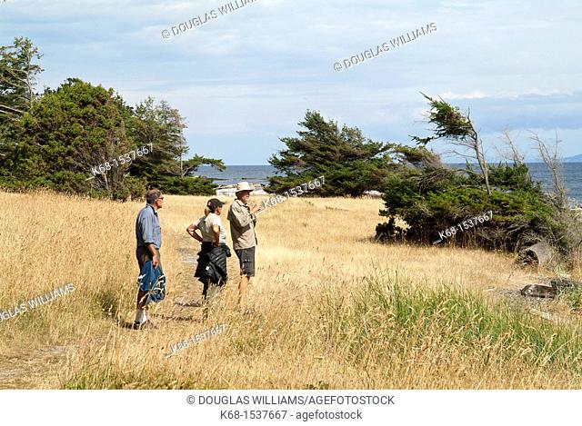 walkers at Helliwell Park, Hornby Island, Gulf Islands, BC, Canada