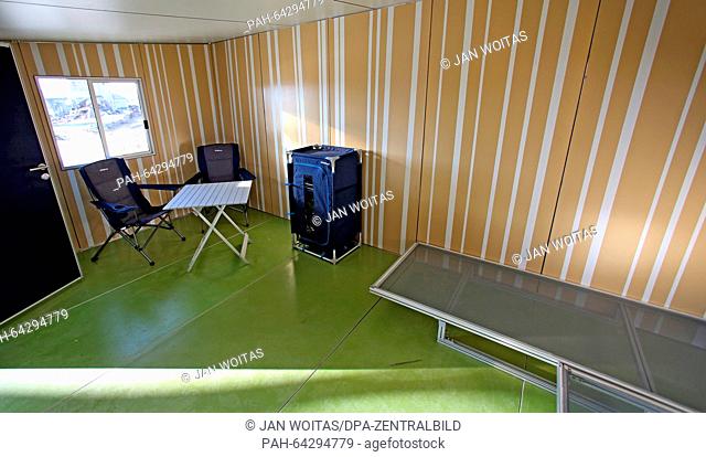 Interior view of a residential container set up in front of a hall of the former postal railway station in Leipzig, Germany, 08 December 2015