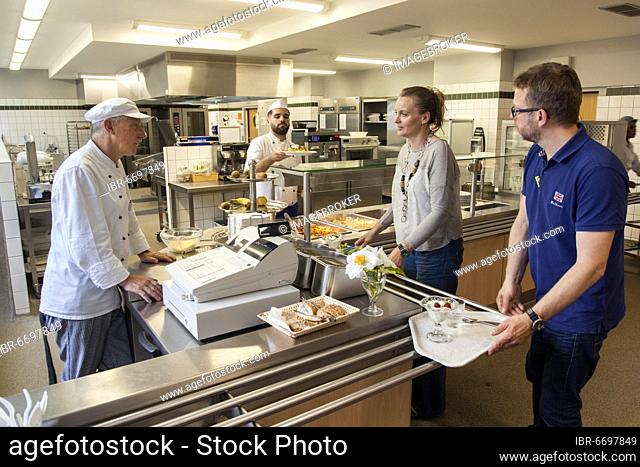 Serving food in a canteen at a vocational college, trainees manage the school's catering as part of their training, Düsseldorf, Germany, Europe