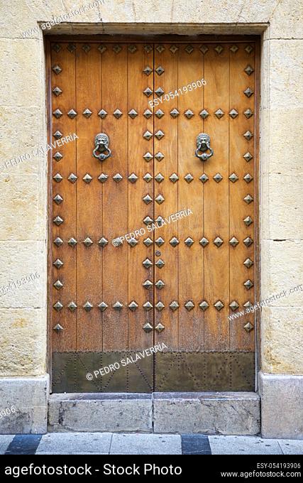 Closeup of an old wooden door in Cordoba, Andalusia, Spain