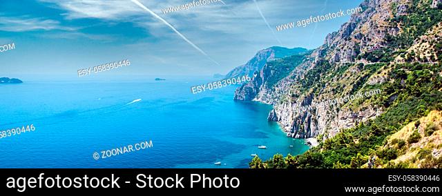 Panoramic picturesque image of beautiful nature in the Via Nastro Azzurro, Amalfi Coast. Stunning idyllic landscape with hills and Mediterranean sea