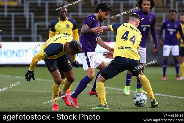 Anderlecht's Lior Refaelov and Union's Loic Lapoussin fight for the ball during a soccer match between Royal Union Saint-Gilloise and Royal Sporting Club...
