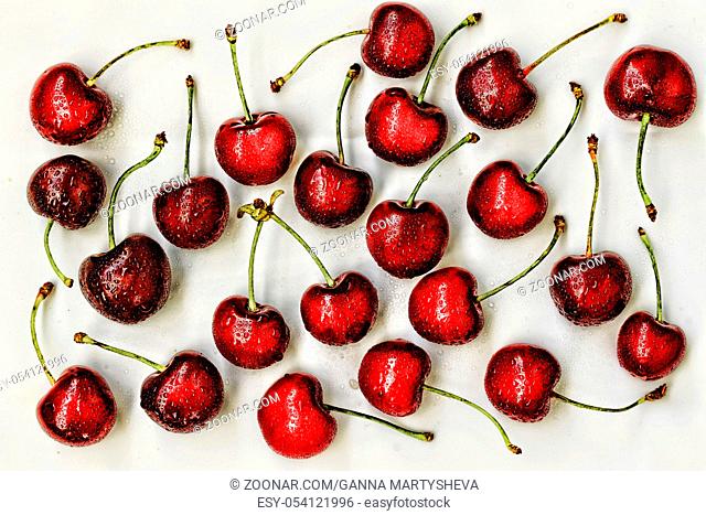 sweet cherry. cherry. a lot of cherries isolated on white with splashes of water