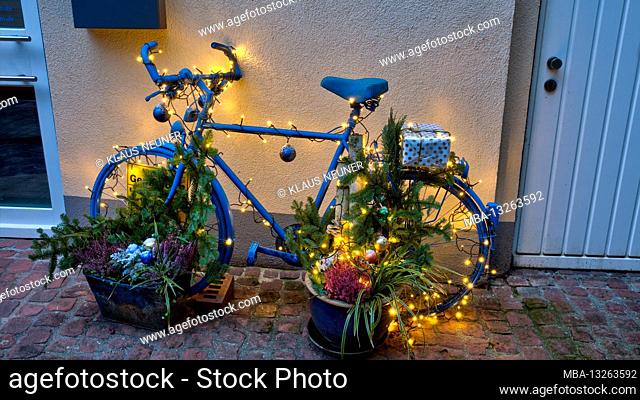 Bicycle, illuminated, house facade, Christmas, decoration, blue hour, Gemünden am Main, Main-Spessart, Franconia, Bavaria, Germany, Europe