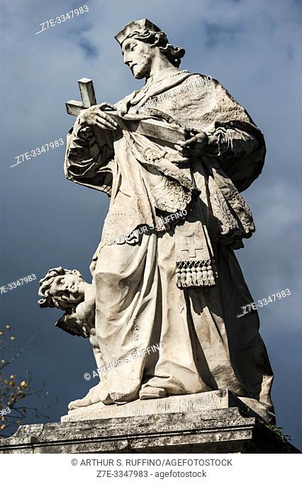 Statue of St. John of Nepomuk. Sculpture by Agostino Cornacchini resting on a plinth at one end of the Ponte Milvio (Milvian Bridge)