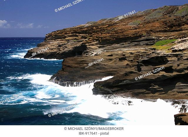Steep cliffs from volcanic rock, which is subjected to the erosion of the ocean, Black Point, Kupikipiki'o, O'ahu Island, Hawaii, USA