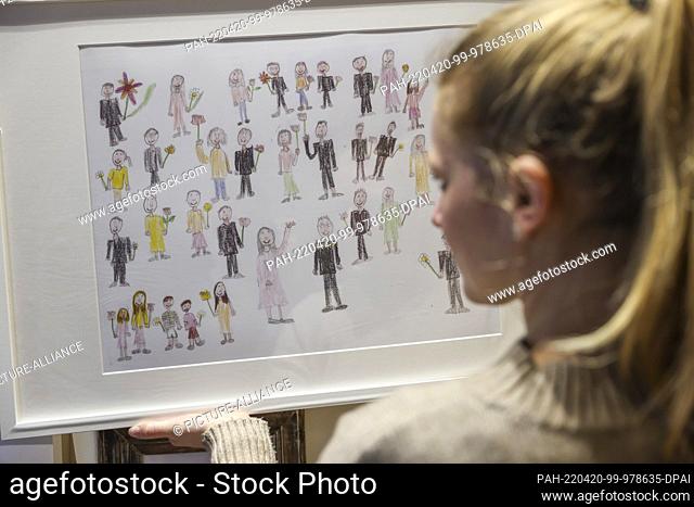 PRODUCTION - 21 March 2022, Saxony, Leipzig: ILLUSTRATION: A woman looks at a child drawing in which all male adults are dressed in black