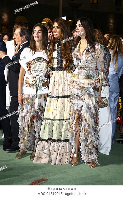 Italian actress Maria Grazia Cucinotta with her daughter Giulia Violati and Lavinia Biagiotti attend the Green Carpet Fashion Awards at Piazza della Scala...