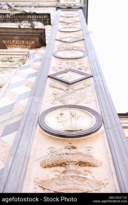Details of the facade of the Colleoni Chapel, in Piazza del Duomo. Upper city. Bergamo (Italy), December 3rd, 2021