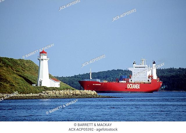 Container Ship near George's Island Lighthouse, Halifax Harbour, Halifax, Nova Scotia, Canada