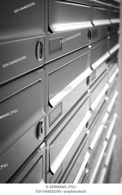 Modern Gray Mailboxes. They can be used for background and concepts. Shallow depth of field