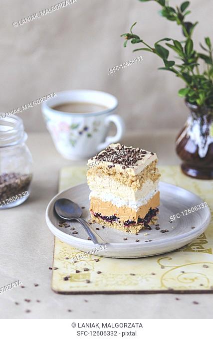 Layer cake with dulce de leche, coconut meringue and coffee frosting