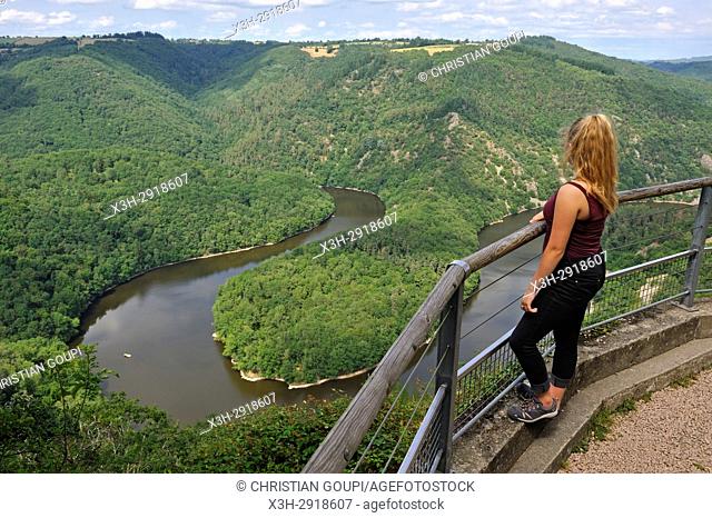 young girl admiring the Queuille's meander (Meandre de Queuille) of the Sioule River from the ''Paradis'' viewpoint, Puy-de-Dome department