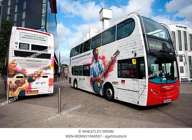Dire Straits frontman Mark Knopfler unveils two iconic London buses to celebrate the launch of Gigs, in association with Gibson