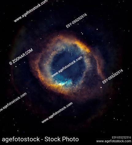 The Helix Nebula or NGC 7293. It is one of the nearest planetary nebulae to Earth, only 650 light years away. Located in the constellation Aquarius