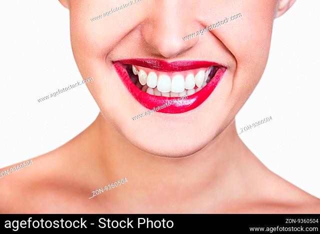 Beautiful wide smile of young fresh woman with great healthy white teeth. Isolated over white background