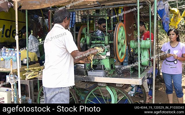 Extracting sugarcane juice Mapusa Goa India