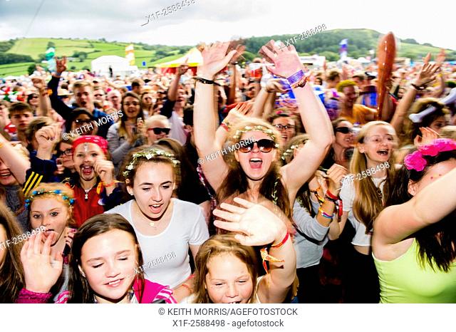 Young people, teenagers, enjoying the The Big Tribute Music festival, Aberystwyth, August Bank Holiday weekend, Summer 2015