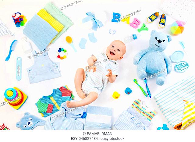 Baby on white background with clothing, toiletries, toys and health care accessories. Wish list or shopping overview for pregnancy and baby shower