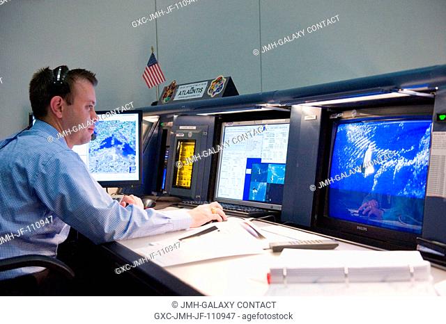 Inside Houston's Mission Control Center, Joshua Byerly, PAO commentator for STS-129, narrates activities of the post-undocking activities of the space shuttle...