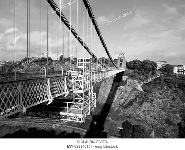 Clifton Suspension Bridge spanning the Avon Gorge and River Avon designed by Brunel and completed in 1864 in Bristol, UK in black and white