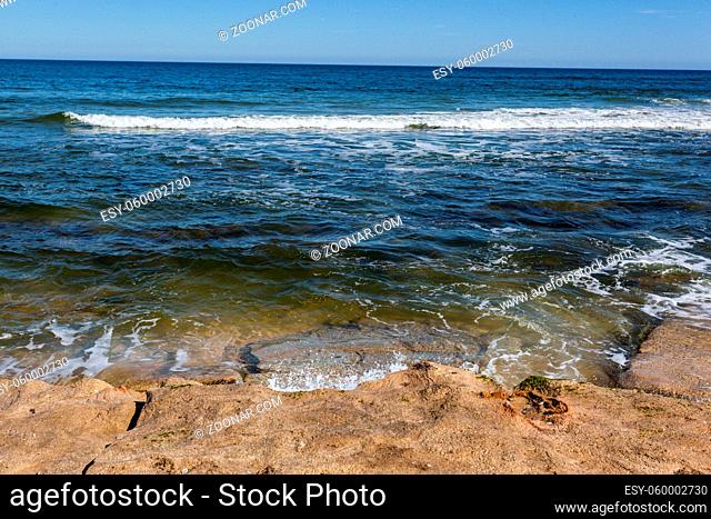 Beach Shore Water Coming in Sand Ocean Landscape Sunny Daytime Vacation Warm Tropical Weather
