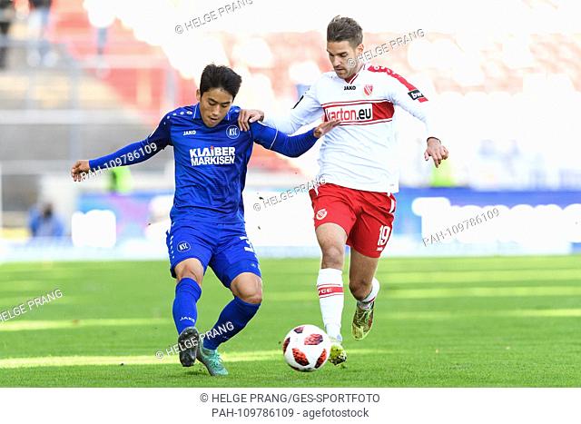 Kyoung-Rok Choi (KSC) duels with Fabian Graudenz (Energie Cottbus). GES / Soccer / 3rd league: Karlsruher SC - Energie Cottbus, 29.09