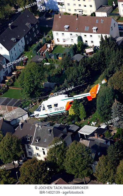 BK 117 police helicopter of the North Rhine-Westphalian police flying squadron during a mission flight, North Rhine-Westphalia, Germany, Europe