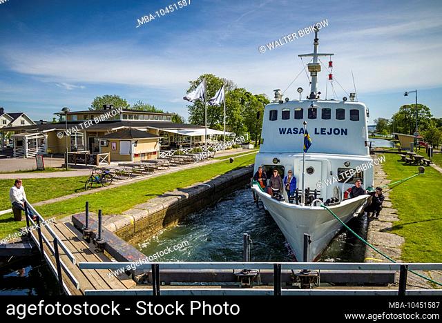 Sweden, Southeast Sweden, Bergs Slussar, small steamer a the locks of the Gota Canal with passengers