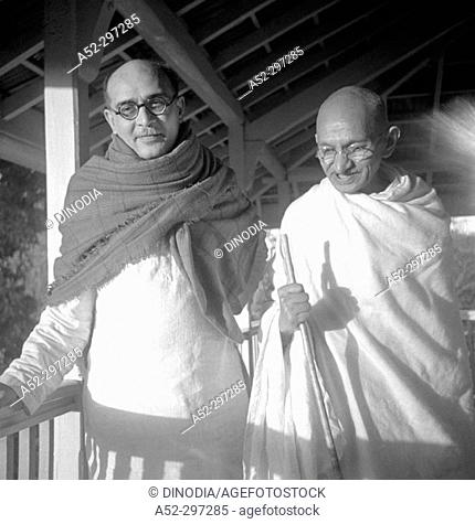 Gandhi with secretary Mahadev Desai, one of Gandhi's two long-serving personal secretaries, at Bardoli. Gujarat. India. 1939