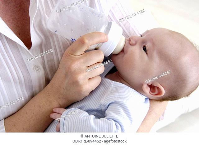 Baby and feeding bottle