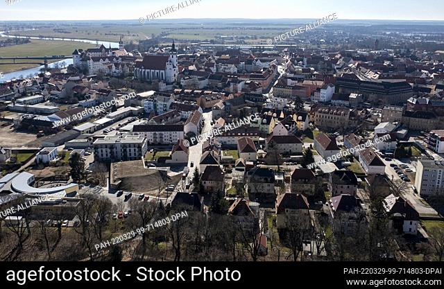 09 March 2022, Saxony, Torgau: View over Torgau towards Hartenfels Castle and St. Mary's Church. On April 23, the starting signal is given for the 9th Saxon...