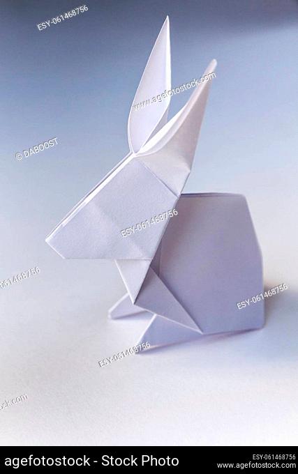 Paper rabbit origami isolated on a blank white background