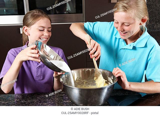 Girls cooking in the kitchen