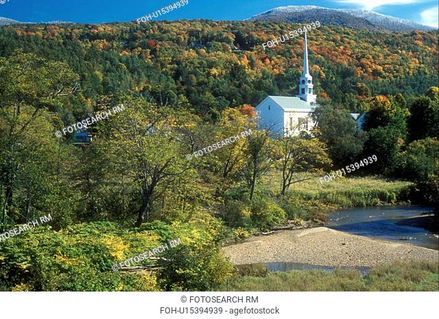 church, fall, Stowe, VT, Vermont, Scenic view of the Community Church in the village of Stowe and the first snow on the mountains surrounded by colorful fall...