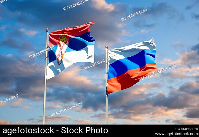 Beautiful national state flags of Serbia and Russia together at the sky background. 3D artwork concept