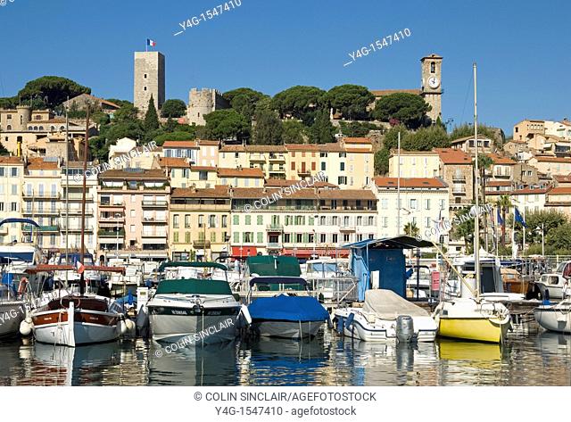 Cannes, harbour, old quarter in background, French Riviera