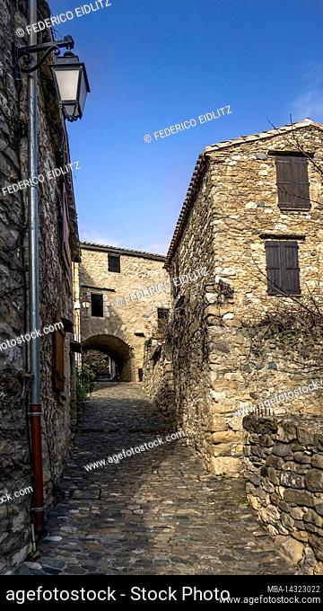 Village street in Minerve. The medieval village was built on a rock. Last refuge of the Cathars, one of the most beautiful villages in France (Les plus beaux...