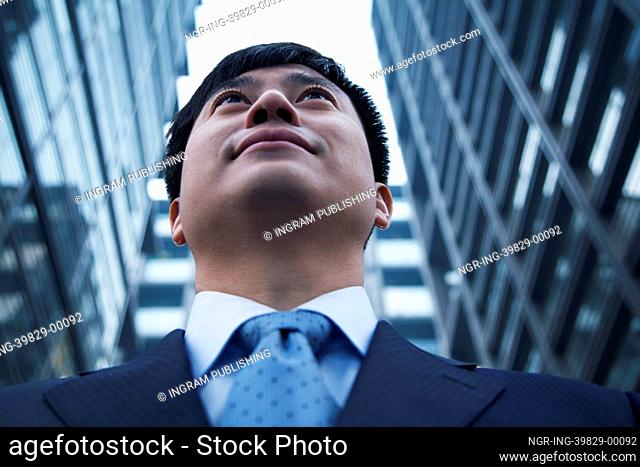 Low angle view of businessman outdoors in Beijing
