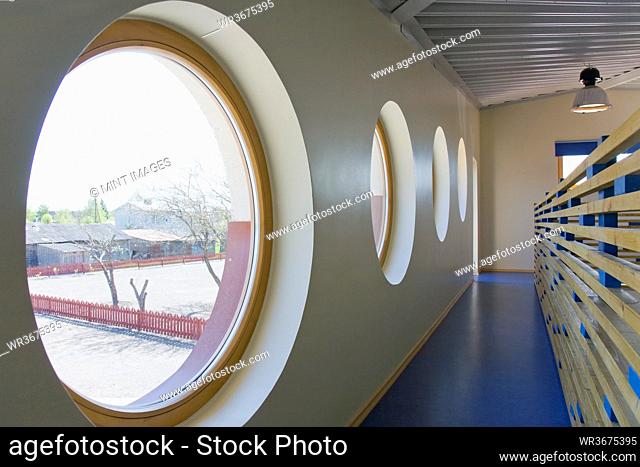 Round Windows in a school corridor