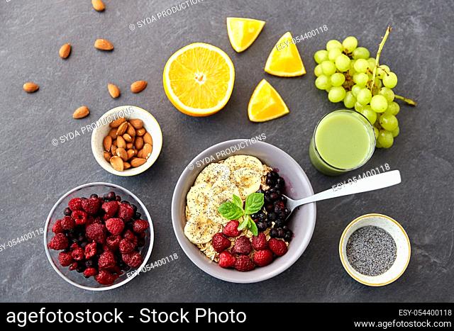 cereal with berries, fruits and glass of juice