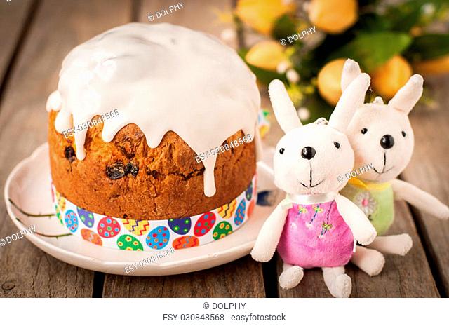 Rustic Style Kulich, Russian Sweet Easter Bread Topped with Sugar Glaze, vintage effect