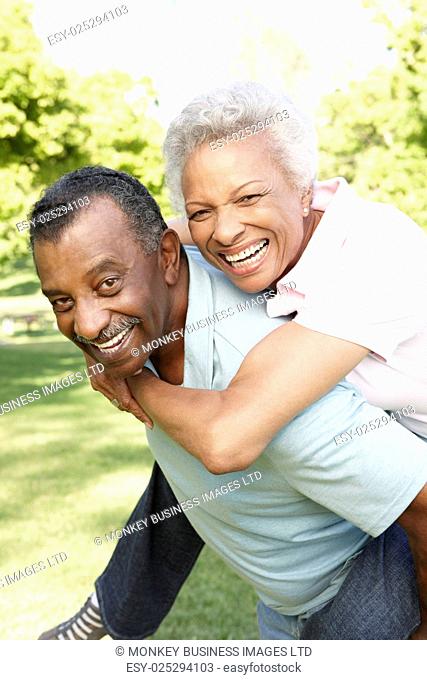 Romantic African American Couple Having Fun In Park