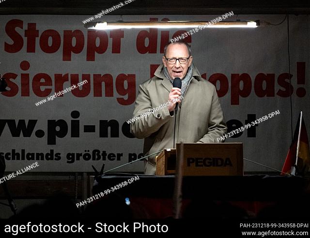 18 December 2023, Saxony, Dresden: Jörg Urban, Chairman of the AfD Saxony, speaks at a rally of the right-wing extremist movement Pegida on Schlossplatz