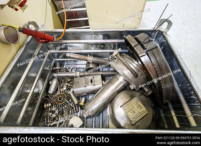 18 November 2022, Hessen, Biblis: Cleaned metal parts lie in a box. The Biblis nuclear power plant has been undergoing dismantling since it was shut down